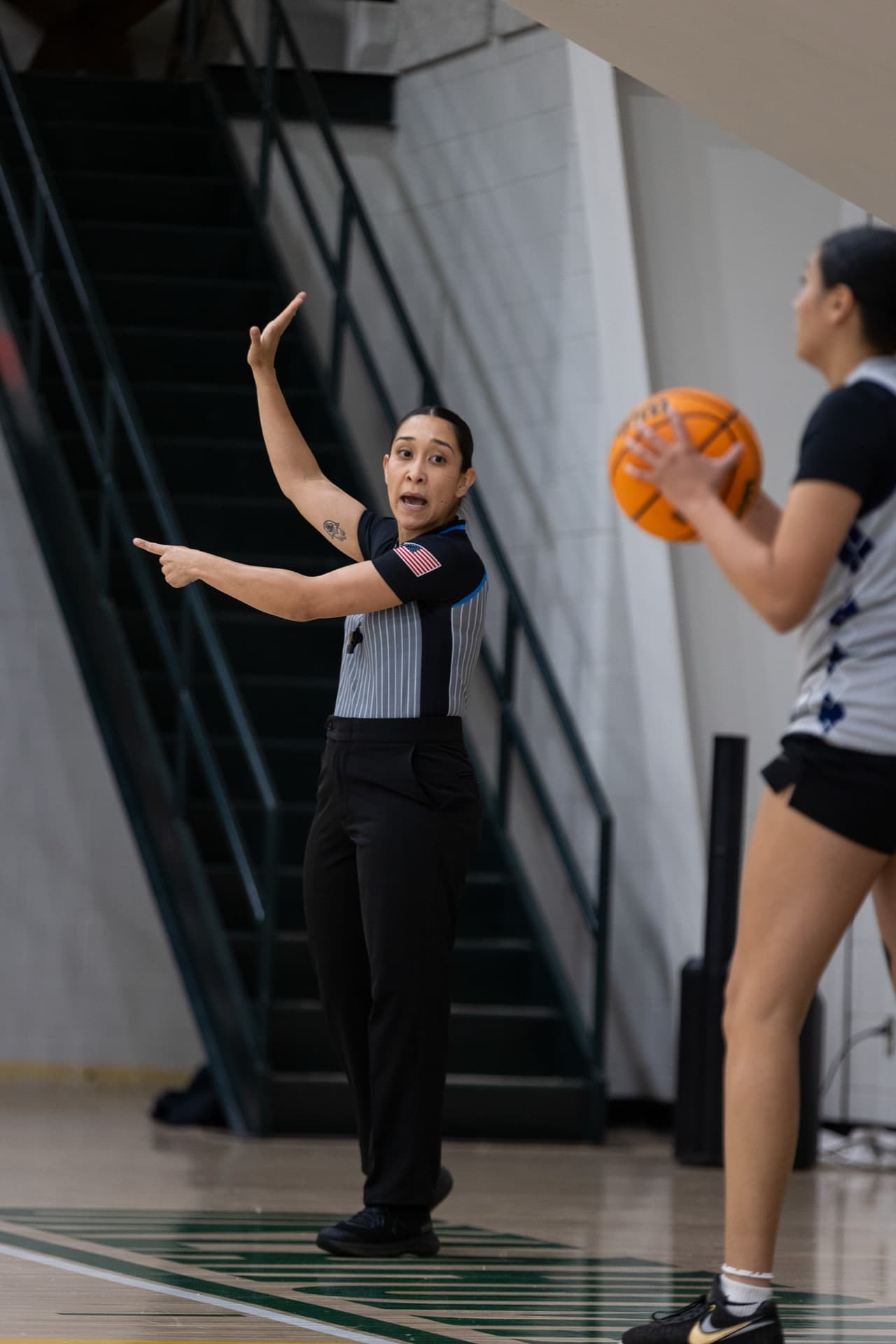 Officials on the court during a game